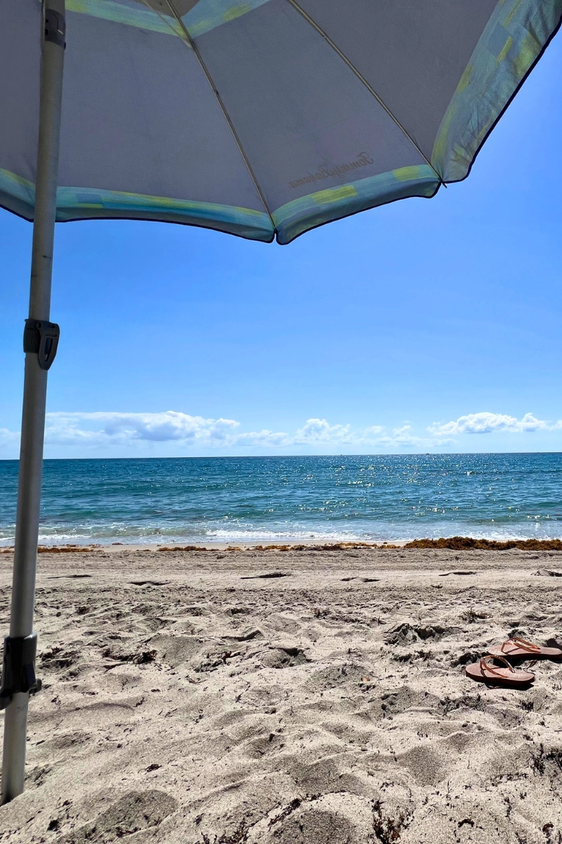 Places to go in Florida is Delray Beach with pretty ocean view and umbrella