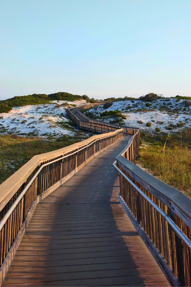boardwalk in Destin Florida leads to beach where to go on vacation