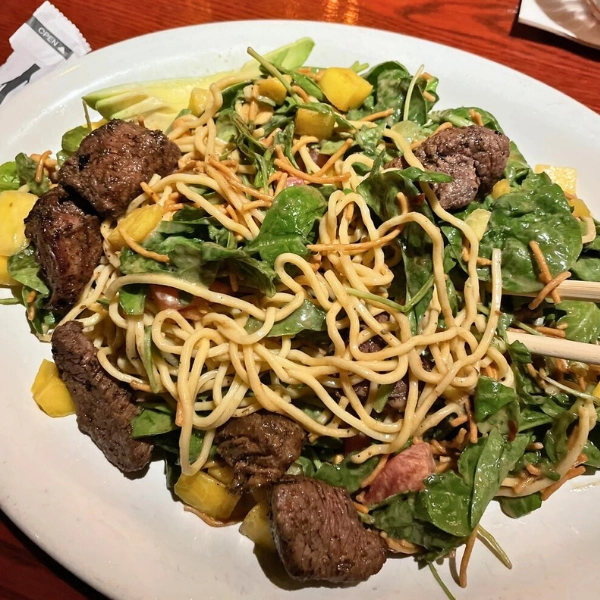 rattlesteak salad with steak and noodles the best at Big Bear Brewing Company in Coral Springs Florida