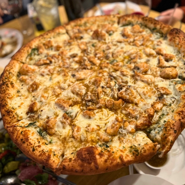 Chicken marsala pizza one of a kind local favorite in South Florida at Pizza Time Caffe in Parkland