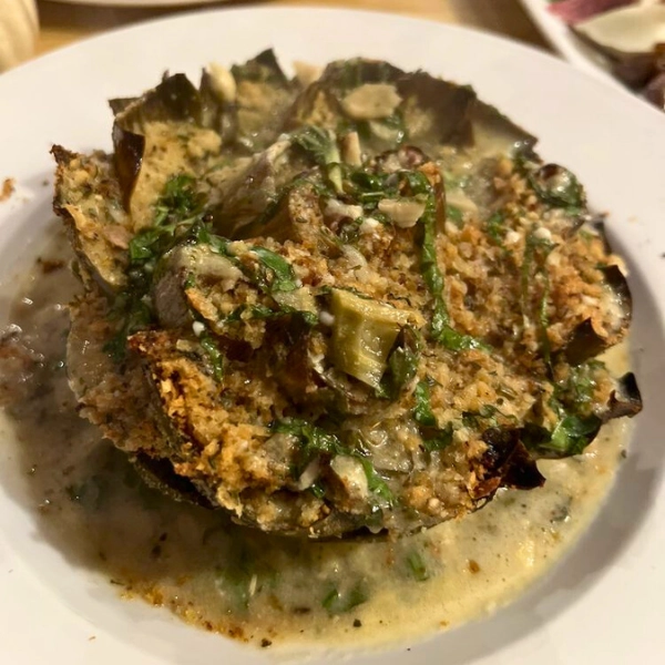 Stuffed artichoke with breadcrumbs dish in Parkland Florida Italian food Pizza Time Caffe