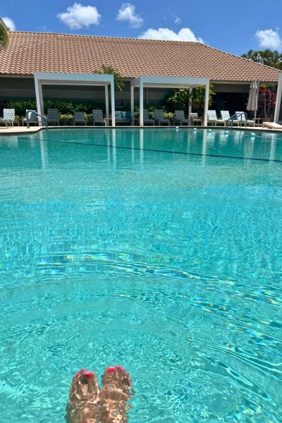View of Stonebridge Country Club pool with feet in water