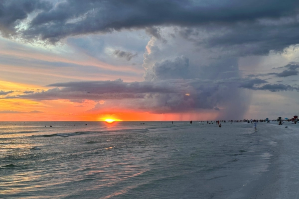 Stormy sky sunset of Sarasota Siesta Key beach a favorite for locals