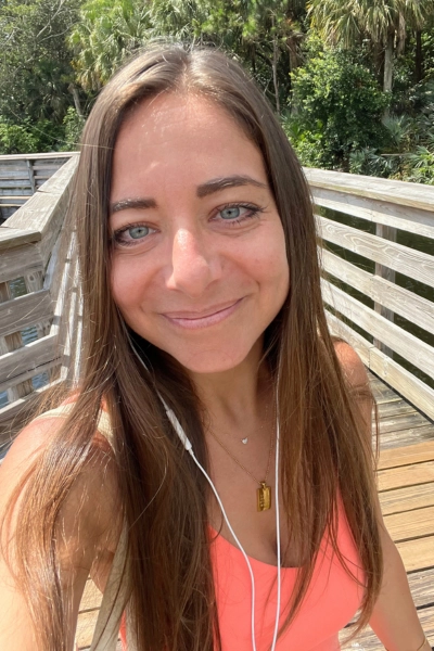 Woman walking on boardwalk in Boynton Beach Florida