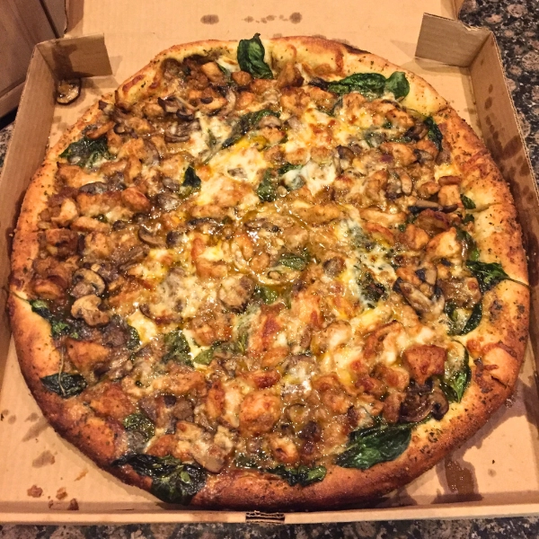 Photo of Pizza to go a Chicken marsala pizza one of a kind local favorite in South Florida at Pizza Time Caffe in Parkland