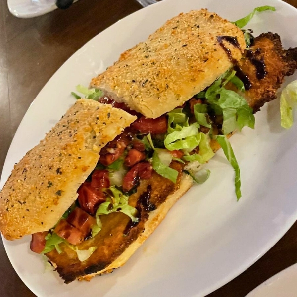 Photo of Dish of Chicken Cutlet Panini at Pizza Time Caffe in Parkland Florida Italian cuisine