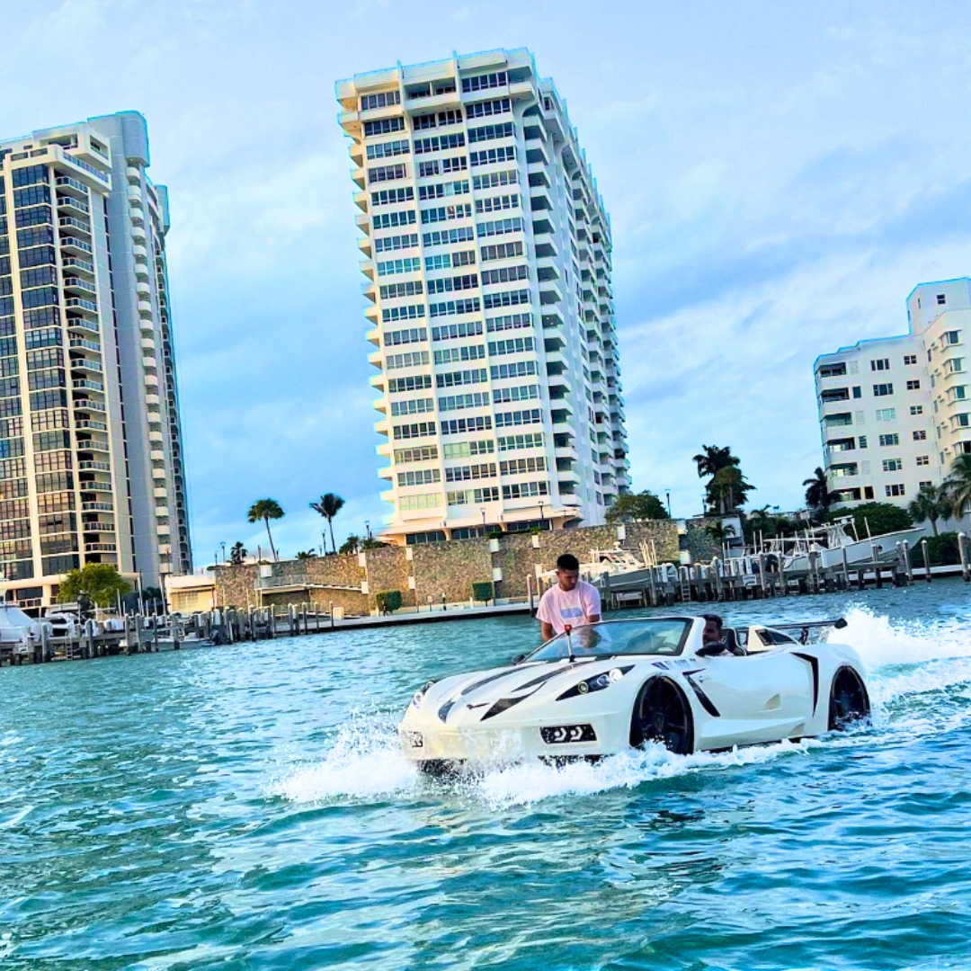 Miami Jetcar and tour mansions riding on a “Mclaren or Corvette” jetski
