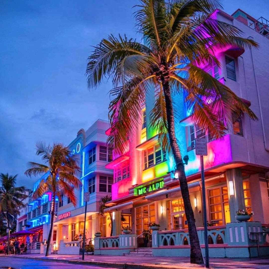 Collins Avenue lit up in rainbow lights in Miami Florida
